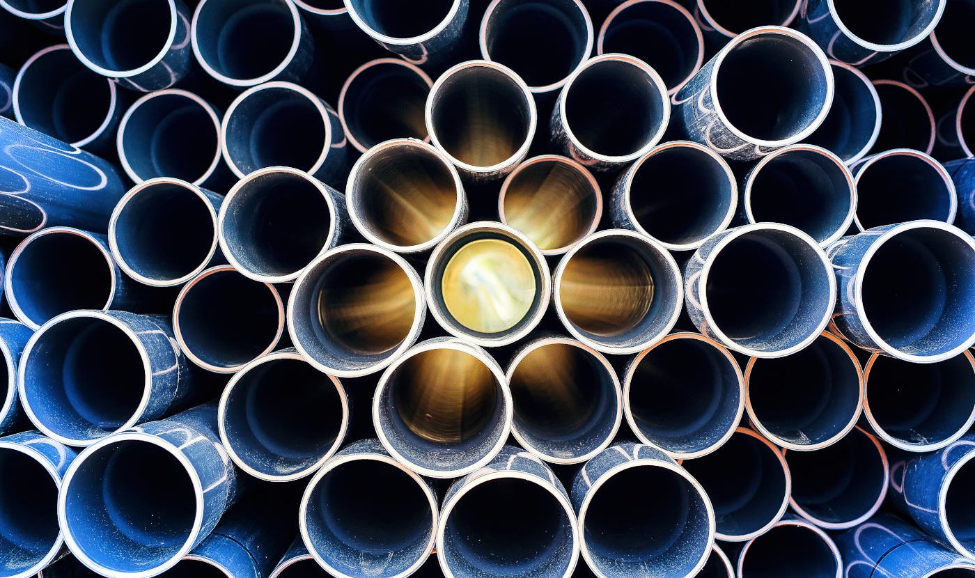 Abstract pattern of aged pvc pipe with sun lights